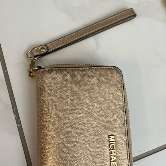 Michael Kors metallic gold zip up wallet or clutch. - Picture 7 of 10